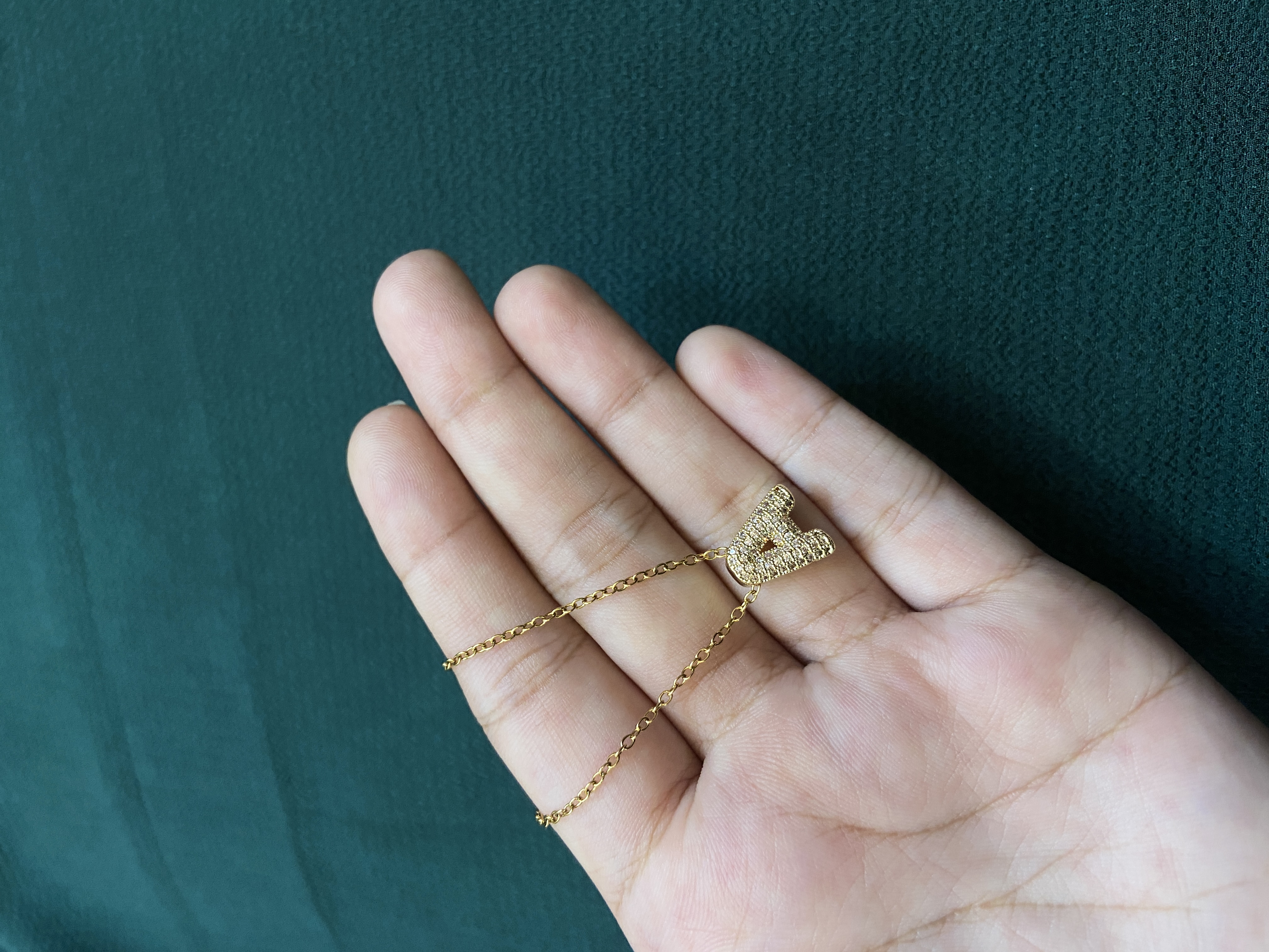 A INITIAL LOCKET WITH CHAIN